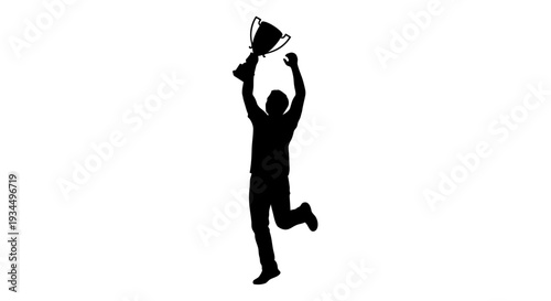 Man holding up a trophy cup.