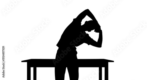 Person Stretching Over A Desk Silhouette.