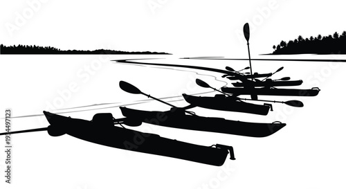 A scenic lakeside view features several kayaks resting on the shore with distant mountains a striking silhouette