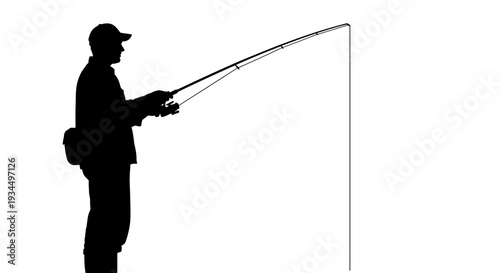 Man holding fishing rod standing still.