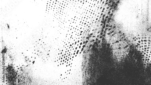 Black speckle pattern on white background with gradient density and scattered dots texture