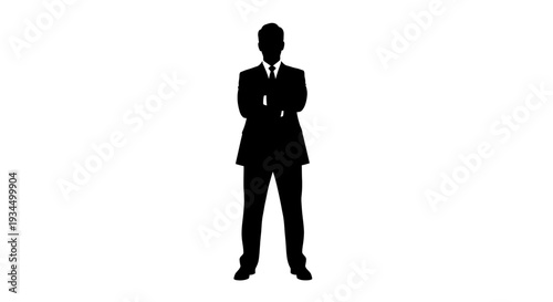 Businessman standing in formal attire.