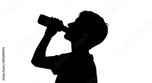 Silhouette of a boy drinking.