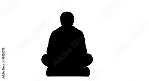 Silhouette of a meditating person sitting.