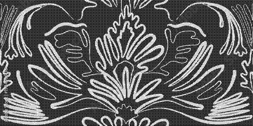 Black and white ornate floral design on dark background with white accents