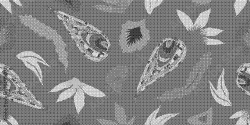 Black and white floral patterns on fabric with leaves and flowers