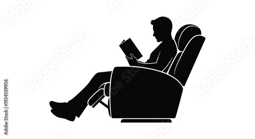 A relaxed man is deeply engrossed in reading a book while reclining in a comfortable armchair silhouette