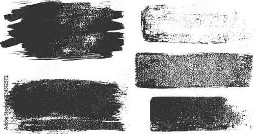 Five dark grey textured brush stroke shapes on white background paint grunge
