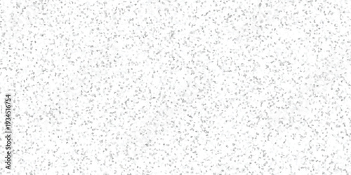 Subtle grey and white speckled background with a mosaic of tiny irregular geometric fragments offering a clean and minimalist textured surface for design