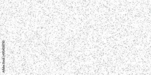 Subtle grey and white mosaic pattern background with irregular small geometric shapes and a textured granular effect for abstract design and digital art