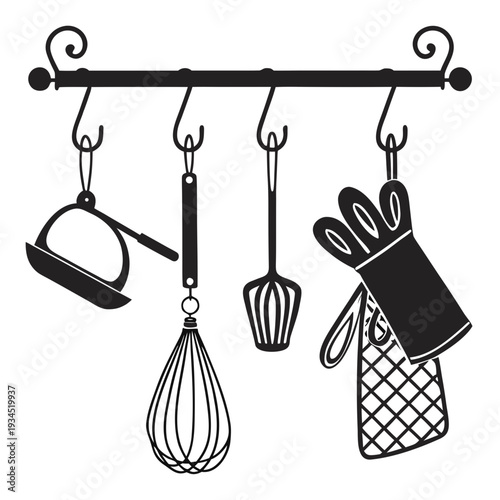 Kitchen tools hanging on a simple rack with various cooking utensils, oven mitt, and pot holder for cooking