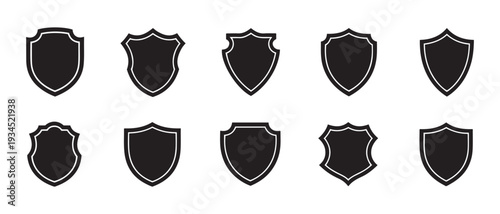 Collection of Ten Black Shield Emblems and Badges, Isolated on White Background, Vector Icons for Security and Protection.