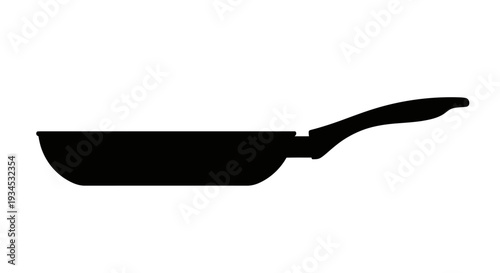 Black frying pan with handle.