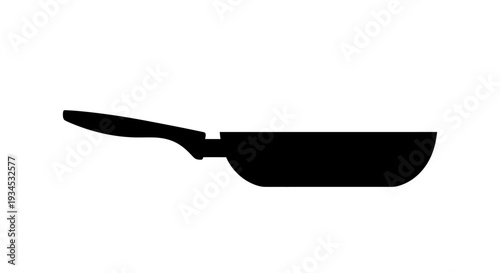 Black frying pan with handle.