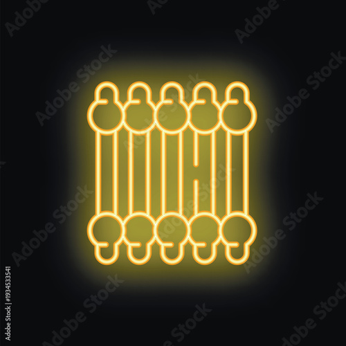 Yellow neon sign of a heating radiator glowing brightly against a dark background, representing home comfort and warmth during cold seasons