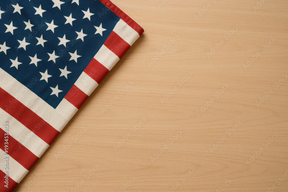 Obraz premium American flag corner accent on light wood surface evoking patriotism, pride, and national holiday celebration