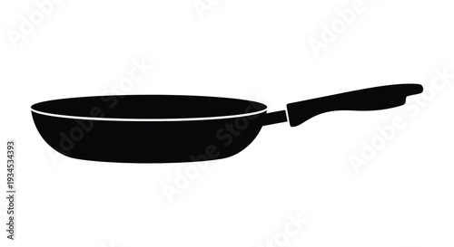 A stark black silhouette of a frying pan is presented against a clean white background conveying simplicity