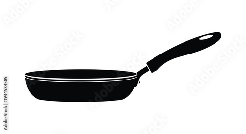 A stark black silhouette of a frying pan against a white background showcasing kitchenware design silhouette high quality
