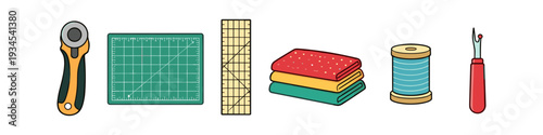 Sewing and quilting tools laid out in a row, including rotary cutter, mat, ruler, fabric, and thread