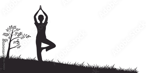 Silhouette of a person practicing yoga in nature with a tree nearby