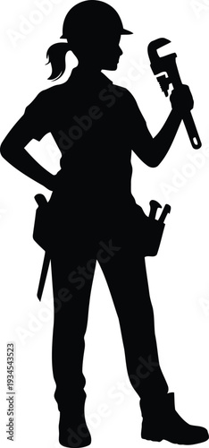 A woman in a hard hat holding a wrench