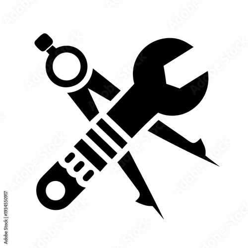 A black and white icon of a screwdriver and wrench crossed over each other