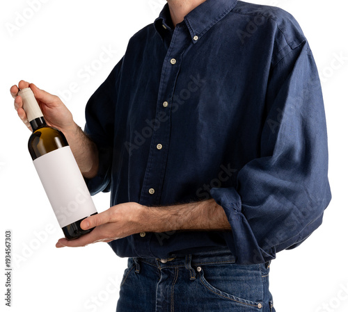 Bilde på lerret Man holds black wine bottle label mockup presentation winery tasting lifestyle e