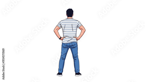 Man wearing a striped t-shirt and blue jeans stands with his hands on his hips looking away from the camera.