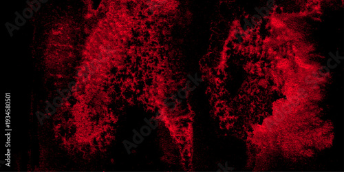 Blood splash space on wall, red horror wall background, dark slate back background. Red color powder explosion isolated on black background. Decorative red panoramic background texture Vintage texture