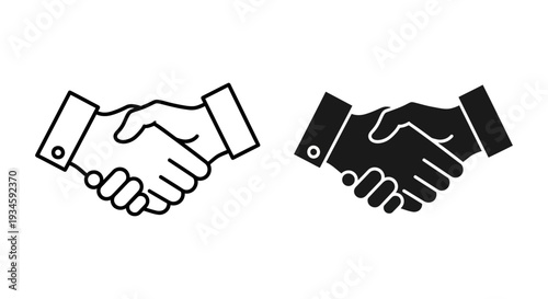 A handshake between two people in a business setting