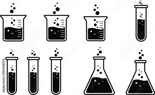A collection of laboratory glassware with liquids