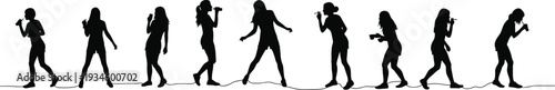 Silhouette singers performing on stage, microphone music concert, live performance group, entertainment show, vocalists singing together, artistic expression, musical event