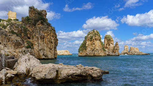 Torre di Scopello, Coastal Cliffs, and the Faraglioni: Panoramic View of Sicily's Iconic Natural and Historical Landmarks