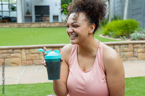 Diagram showing three point charges (+20nC, -20nC, -20nC) on xy-plane with z-axis upward in vacuum