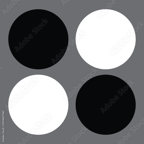 Four circles two black and two white on gray
