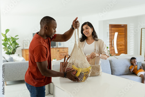 Male developer coding Newton solver with line-search at desk using vector x solving Laplacian q(x)