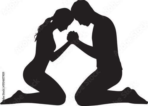Silhouette of two people kneeling and praying together in black and white hands clasped