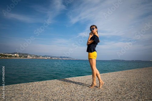 girl against the backdrop of the sea