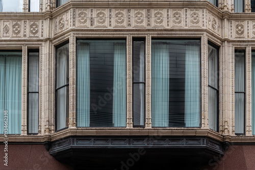 Rectangular window with an alcove, decorated with carved beige tiles. From the Windows of the World series.