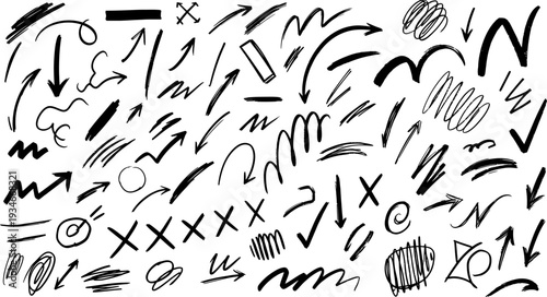 A collection of various black silhouette arrows and marks on a white background featuring a range of shapes and symbols in silhouette