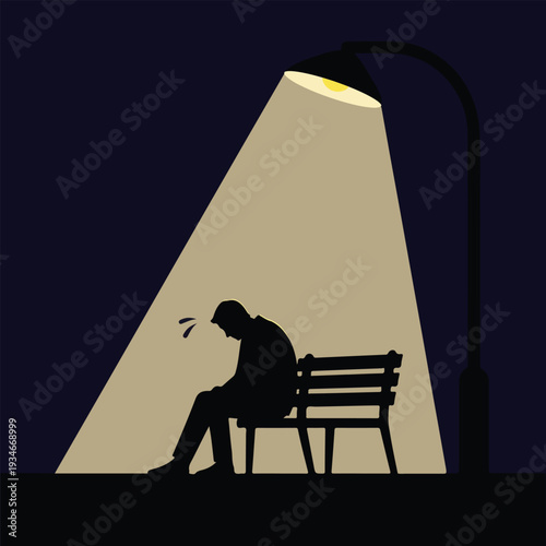 Sad Man Sitting Alone Under Street Light at Night