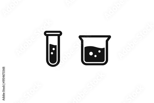 Laboratory setup with test tube and beaker filled with liquid during