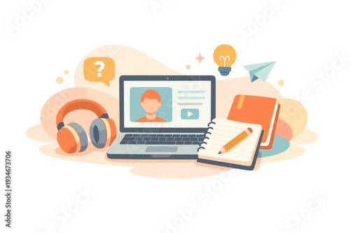 Online learning setup with laptop headphones notebook and study
