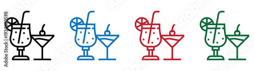 Set of four cocktail glasses with colorful straws and fruits isolated on white background