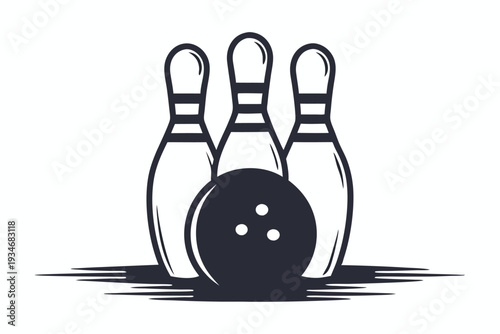 A black bowling ball sits in front of several bowling pins in monochrome