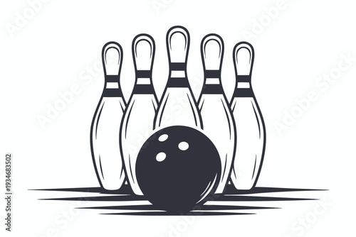 A black bowling ball sits in front of several bowling pins in monochrome