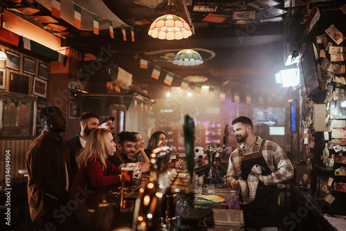 Wallpaper Mural Bartender serving diverse customers at rustic pub gathering Torontodigital.ca