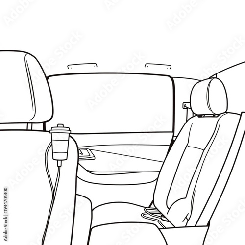 A car interior with a travel coffee cup, charging cables, and a jacket on the back seat, real commuter life