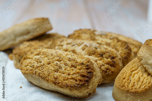 Canvas Print Polvorones and mantecados, traditional Christmas cakes from Andalusia, Spain, on wooden background, view from above