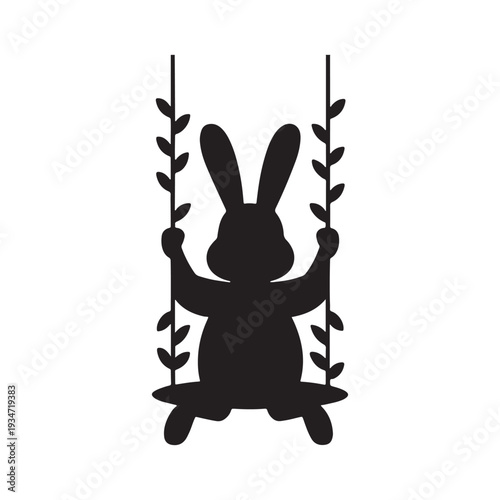 Easter day fun with a silhouette of a bunny on a swing